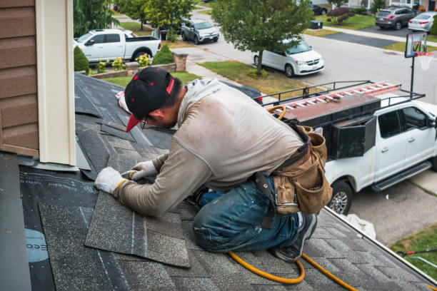 Professional Emergency Roof Repair technician working in Garrett, TX